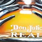 Close-up detail shot of the oil-painted Don Julio Tequila bottle.