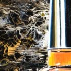 Vibrant acrylic pouring technique in Monica Marquez Gatica's Hyper Fluid Realism artwork, showcasing the dynamic and fluid nature of the creative process.