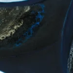 Detailed view of acrylic pour technique on a Sherry wine bottle painting, showcasing intricate patterns and textures.