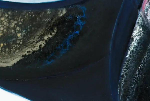 Detailed view of acrylic pour technique on a Sherry wine bottle painting, showcasing intricate patterns and textures.