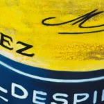 Intricate detail of a Sherry wine bottle and glass shadow in a contemporary realist painting.