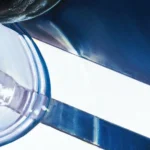 Detailed oil painting capturing the reflective sheen and shadow of a glass of Jerez Sherry