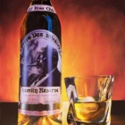 Large-scale hyper-realistic painting of a Pappy Van Winkle 23-year-old bourbon bottle and glass by Monica Marquez Gatica